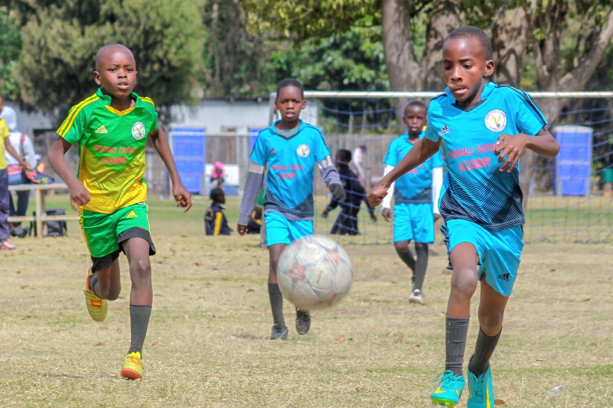 Primary learners in a U9 football session