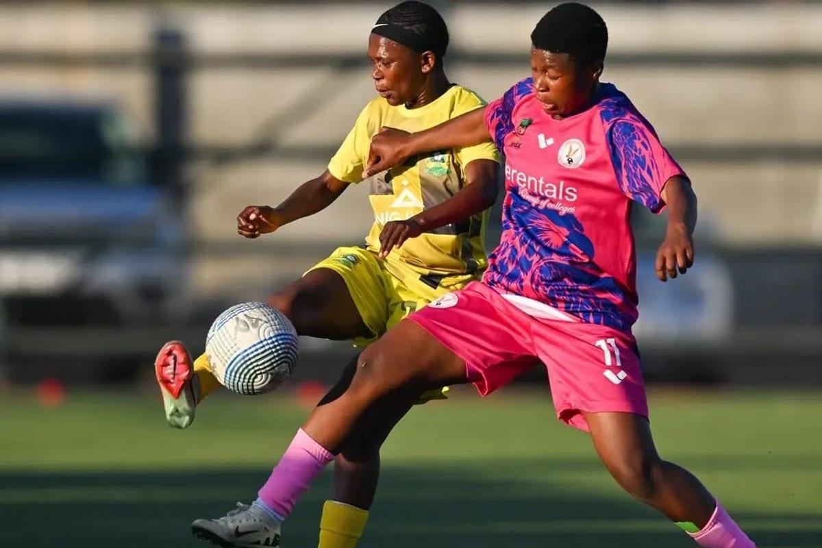 Herentals Queens contesting the ball in Premier Soccer League action
